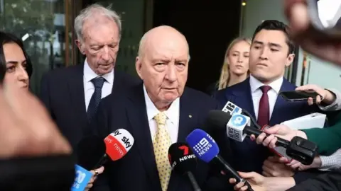Sex Abuse Allegations Against Leading Australian Media Personality Reduced